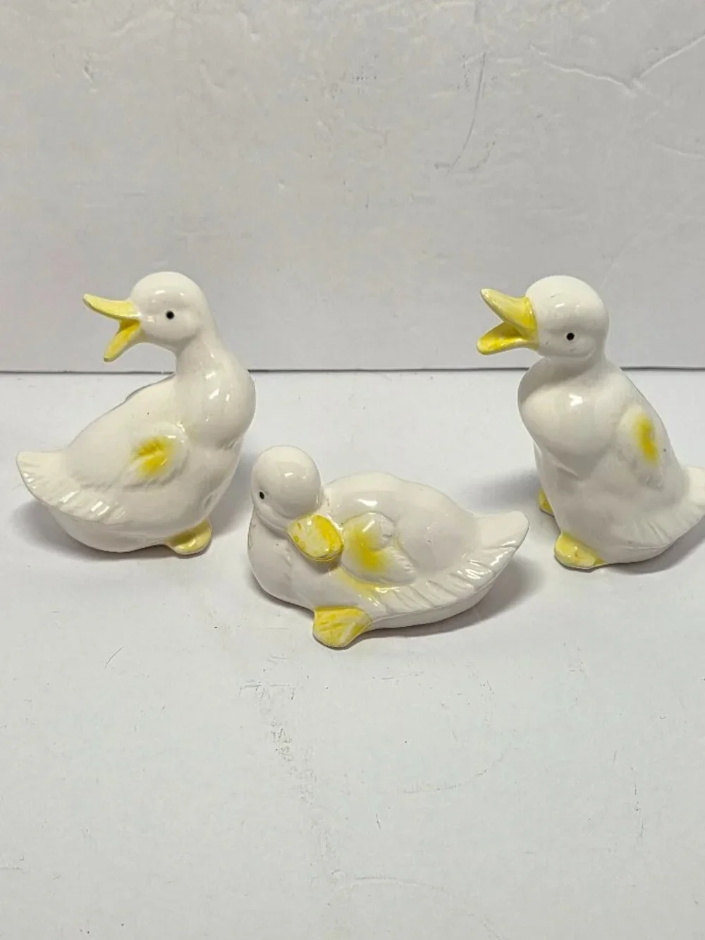 Set of 3 Ceramic Duck Figurines 4in Long 3in Tall White/Yellow Glossy